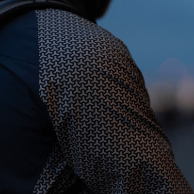 lifestyle Solaris Men’s Reflective Waterproof Active Jacket navy close up of reflective print