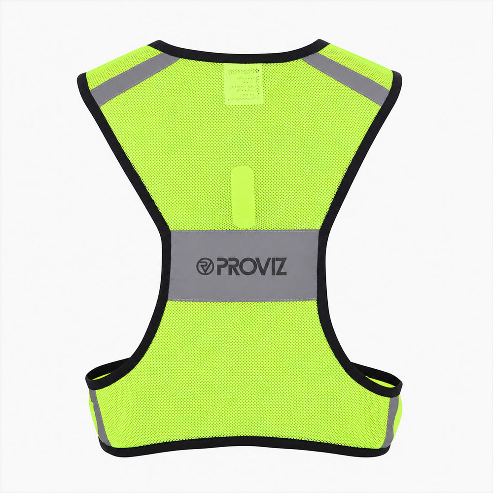 A high-visibility neon yellow-green mesh running vest with reflective gray panels and black trim, featuring the brand name 'PROVIZ' printed on the center back, shown against a plain white background.