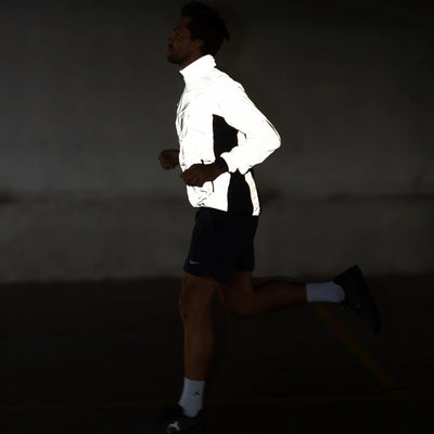 listing-lifestyle Men's Fully Reflective Running Jacket 2.0 man running at night showing reflectivity