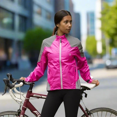 lifestyle Women's Reflective & Waterproof Cycling Jacket pink in city