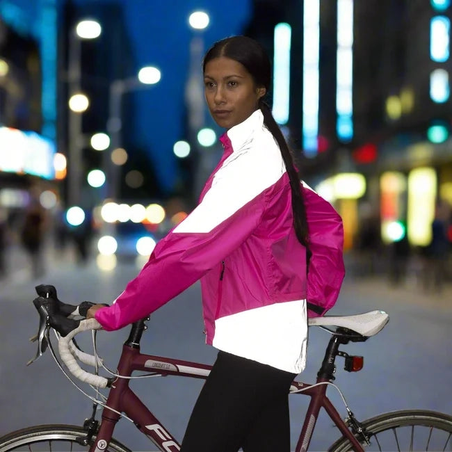 lifestyle Women's Reflective & Waterproof Cycling Jacket reflectivity in city pink