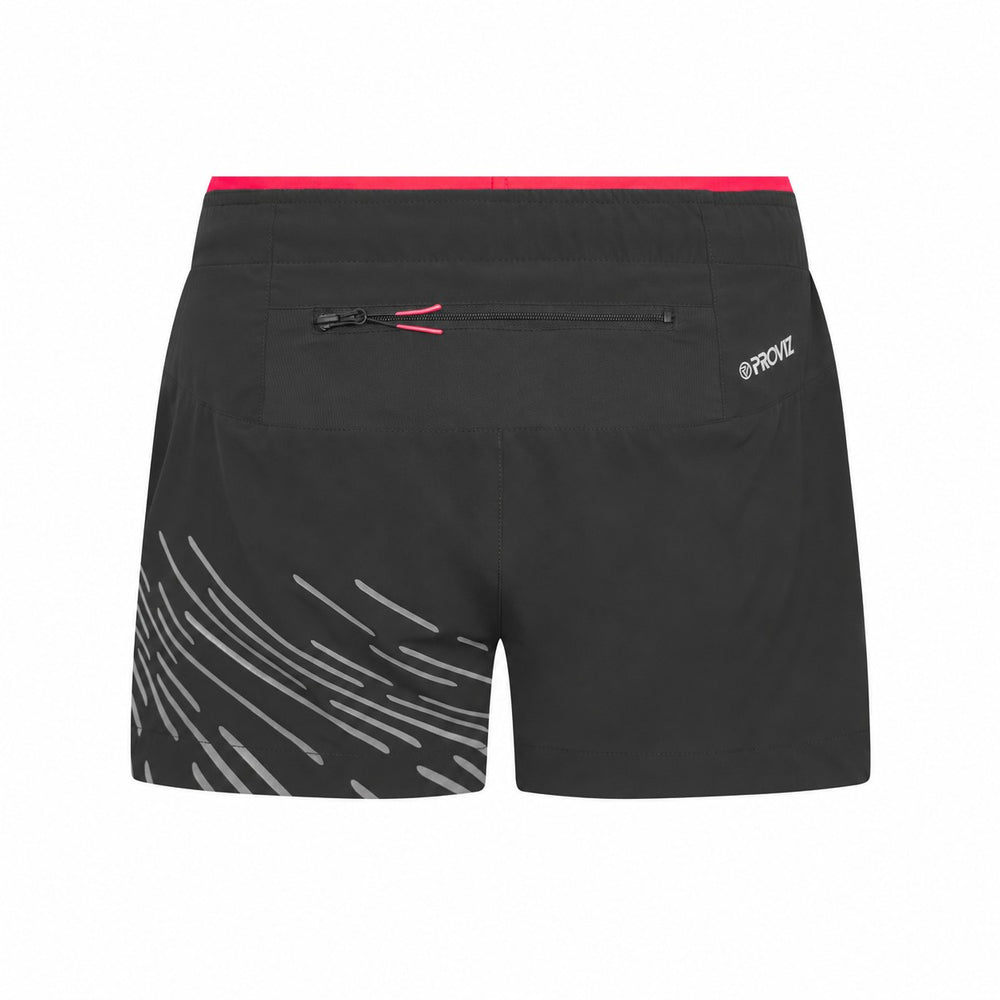 Black athletic proviz shorts with a bright pink waistband, a zippered pocket, gray diagonal stripe graphics on the lower left leg, and a white Proviz logo on the right side, shown against a plain white background.
